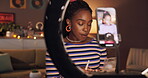 Live streaming, ring light and makeup with black woman in home for influencer, promotion or brand. Virtual tutorial, content creator and beauty artist review with person and phone for vlog broadcast 