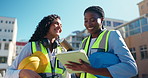 Conversation, architecture and women in city, tablet and teamwork with blueprint proposal. Renovation, construction site or engineering with tech, real estate or cooperation with schedule for project