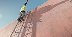 Low angle, contractor and man on outdoor ladder for installation, building and construction, Rooftop, talking or cable technician with instruction on steps for electrical checkup or service on wall