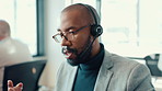 Call center, talking and man with headset in office for communication, contact us and support. Professional, corporate and person speaking for online help, consulting business and customer service