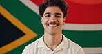Face, man and joke with flag for South Africa, confidence and laughing with pride for citizen. Portrait, male person and patriotic with fabric for nationality, country and positive attitude by symbol
