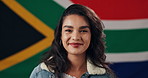 Face, woman and fabric with flag for South Africa, confidence and pride with smile for citizen. Portrait, happy person and patriotic with laugh for nationality, country or positive attitude by symbol