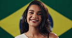 Woman, face and happy with Brazil flag in studio for national pride, confidence and patriot by background. Person, model and smile in portrait with symbol, respect and sign with loyalty to country
