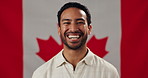 Canada, happy and face of man with flag for country pride, loyalty and citizenship. Happy, ethnicity and portrait of person with symbol, sign and fabric for nationality, identity and patriotism