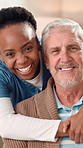 Nurse, senior man and smile with face, hug and wellness in home for kindness. Mature patient, caregiver or medical professional in lounge with gratitude for retirement, service and advice or support