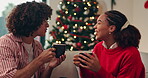 Smile, couple and talk with drink on Christmas for holiday tradition, comfort and festive season. Happy, people and cheers with beverage, eggnog and bonding together for weekend celebration at house