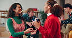 Smile, women and friends with gift for Christmas event, thank you and festive celebration. Happy people and hug for giving present, show gratitude and bonding together for holiday tradition at house