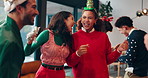 Dance, happy and friends at christmas party with music for fun, celebration or festive season. Laugh, event and group of people with xmas playlist for groove together with holiday song in home.