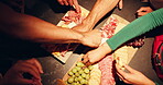 Food, hands and people with eating from charcuterie board at night for dinner, nutrition or hungry. Above, friends and snacks selection for social gathering, organic diet or healthy meal for wellness