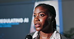 Speaker, seminar and black woman with microphone at event for regulating ai and innovation. Female leader, convention or conference by screen for learning about risk management for future of tech