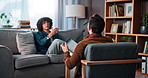 Advice, talking and psychology with man on sofa for counseling, mental health and discussion. Therapy session, trauma rehabilitation and healing with person in clinic for support and progress