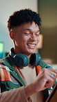Smile, man and laugh with tablet at house for research, news trend and live streaming platforms. Male person, influencer and digital for reading comments, social media post and editing podcast script