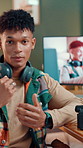 Man, influencer and live stream for chat, face and gear by computer screen, advice and web in home. Person, presenter and podcast for video editing tips on channel, tech and social media in Brazil