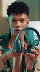 Live streaming, face and man with headphones for review, sound quality or design. Content creator, talk or show tech for product sponsorship, promotion or advertising with audiophile with pov at home