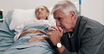 Crying, sad and mature couple in hospital bed with bad news, terminal diagnosis and medical results. Healthcare, marriage and man with woman praying for healing, support and hope for surgery recovery