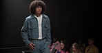 Fashion, walking and runway with man at event for designer collection, clothing showcase and couture. Fabric, wardrobe and luxury catwalk show with model on stage for trendy, and style industry