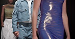 Fashion week, walking and designer with model on runway for event showcase, luxury industry and outfit. Couture line, trendy wardrobe and catwalk with people on stage for style collection and clothes