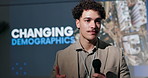 Microphone, presentation and businessman at conference with speech for changing demographics. Seminar, screen and male sociologist with workshop for target market training at convention center.