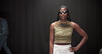 Fashion week, photograph and designer with woman on runway for event showcase, luxury industry and outfit. Couture line, trendy wardrobe and catwalk with people on stage for style collection