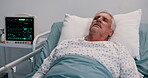 Elderly man, sleeping and bed in hospital for post surgery, recovery and tired from anesthesia. Senior patient, asleep and iv drip of healthcare services, wellness and treatment from operation in ICU