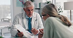 Doctor, mature man and patient with contract for medical aid, life insurance or application in clinic. People, explain healthcare and clipboard for form, survey or documents for service registration