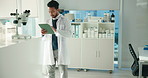 Man, scientist and tablet for chemistry in lab for research, medical study and data entry of results. Person, digital and checklist for experiment, review feedback and report update for vaccine trial