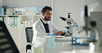 Microscope, science and laptop with man in laboratory for forensic, toxicology report and research. Medical analysis, pathology screening and tissue sample with person in clinic for investigation