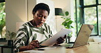 Woman, freelancer and writing on clipboard with calculator for finance, accounting or budget. Document, remote work and serious African person with tax invoice, bookkeeping and audit review at home
