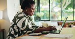 Happy, entrepreneur and woman with glasses, laptop and calculation for financial success on website. Online, typing and black person with tech for asset management, smile and return on investment