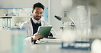 Man, scientist and reading on tablet in lab for research, medical study and online results. Male person, microscope and checklist for experiment, review feedback and report update for vaccine trial