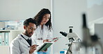 Microscope, tablet and research with people in laboratory for science, medical trial and microbiology. Virus study, pathogen report and immune cell experiment with scientist in clinic for innovation