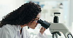 Microscope, woman and scientist in laboratory for analysis of medical DNA stems for pharmaceuticals. Biotechnology, research and female microbiologist with equipment for RNA development or discovery.