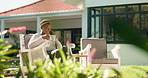 Phone call, coffee break and black woman in backyard for gossip, relax and drink on weekend by home. Smile, talk and African person with technology, conversation and communication and happy in garden