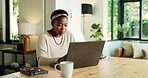 Woman, typing and remote work with laptop, home and planning for blog post, online and social media. House, writer and black person with tech for article, freelancer and proofreading of draft on web