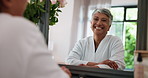 Mature, happy woman or spa with mirror in robe for holiday, weekend or pamper at beauty salon. Senior, female person or smile with reflection in comfort for treatment day or vacation at luxury resort