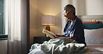 Bedroom, glasses and old woman with book for reading, knowledge and literature story in retirement. Home, senior person or learning with novel of fiction, romance or hobby for female pensioner in bed