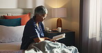 Bedroom, glasses and old woman with reading book to relax, knowledge and literature in retirement. Home, senior person and learning with novel of fiction, romance or hobby for female pensioner in bed