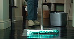 Home, spring cleaning and person with mop, floor or bucket with chemical for disinfection or chores. House, legs and prevention of germs in apartment, routine and removal of dirt with equipment