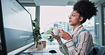 Business woman, coffee break and reading in office with thinking, morning routine and feedback. Professional, research and web article review with journalist, editor and report for information