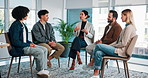 Consulting, counseling and group therapy with people in office together for advice, growth or healing. Accountability, meeting and support with man speaking to therapist in session for psychology