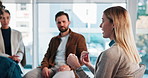 Woman, support group and discussion for therapy with help, depression recovery and anxiety. People, talk and psychologist with circle for counseling, share story or advice for mental health in clinic