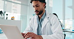 Serious, scientist and man with laptop, online or medical research on website, biotechnology or lab. Clinic, researcher and person with tech for project, typing and article for science and healthcare
