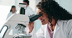 Research, science and woman with smile, microscope and breakthrough with study for vaccine. Happy person, solution and scientist in lab, equipment and biotech with test and analytics for dna sample
