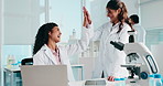 High five, women and scientists with laptop in laboratory for team achievement with medical research. Happy, celebration and female biologists with pharmaceutical innovation, discovery or project.