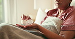 Sick, mature woman and pills with medicine for pain, virus or insomnia in bed. Healthcare, flu and senior person in bedroom for sleep with illness, infection or cold prescription for recovery