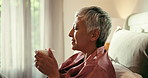 Coffee, smile and senior woman with thinking in home for memories, nostalgia and morning routine. Relax, bed and wellness with happy mature person drinking caffeine beverage in apartment for weekend