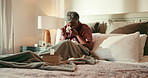 Sneeze, blowing nose and senior woman in bed with allergies, flu or cold on weekend morning in home. Illness, sneezing and mature female person in retirement with tissue for sinus in bedroom at house