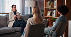 Sofa, couple and psychologist with talking for counseling, marriage advice and support for healing. Therapy, therapist and woman with people in relationship, consultation and helping with guidance