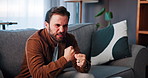 Man, anger and talk with therapist for mental health, support or stress management on sofa at clinic. Person, psychology and discussion for anxiety, conflict and guide with consultation on couch