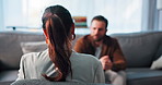 Therapy, consultation and back of psychologist with man for mental health, stress or burnout support. Talking, psychiatry evaluation and therapist with male patient for counseling session at clinic.